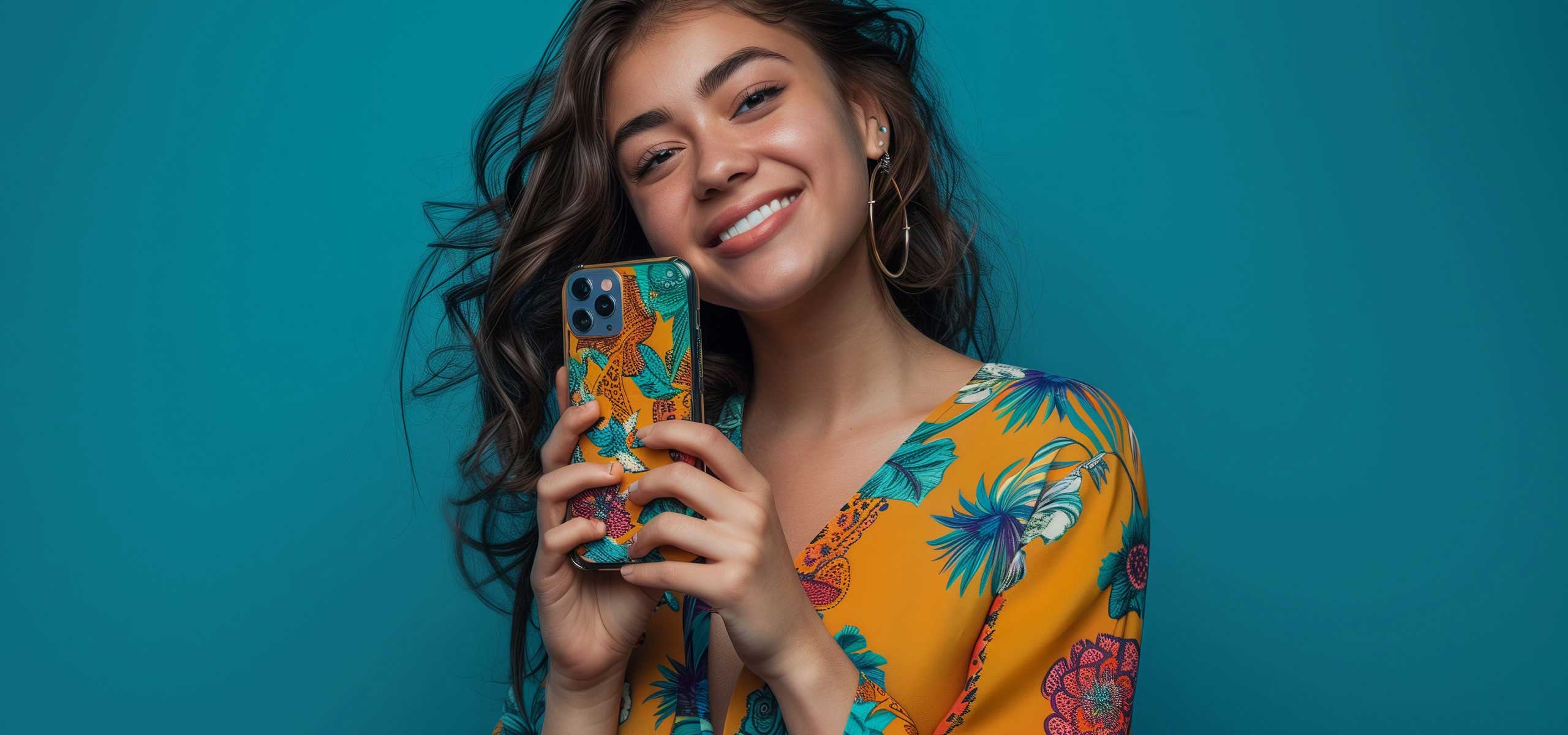 A picture of a female model from Stikis smiling with a smartphone case.